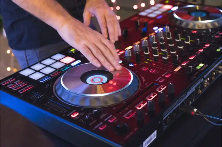 DJ is mixing some music with controller
